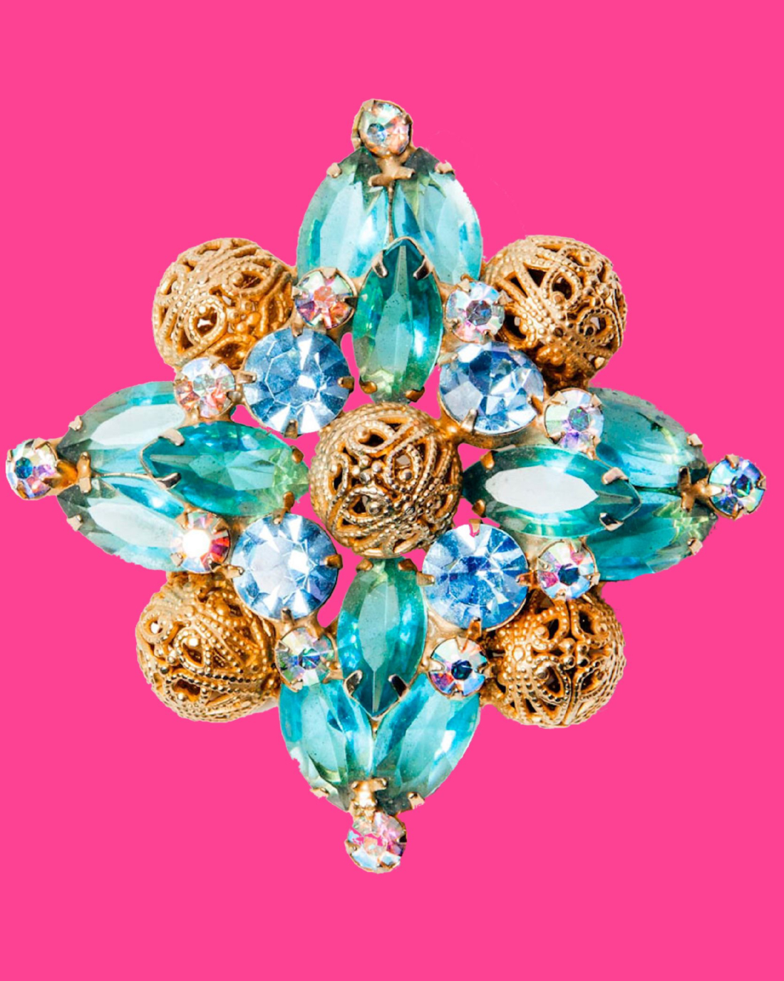 Gold and blue crystal brooch